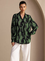 Women's Black Moss mulberry silk lapel collar blouse with green abstract print.