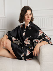 Women's black 19Momme mulberry silk kimono robe with crane print and 3/4 sleeves.