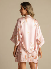 Pink 19Momme mulberry silk kimono robe with crane print, 3/4 sleeves, and wrap design for women.
