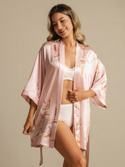 Pink 19Momme mulberry silk kimono robe with crane print, 3/4 sleeves, and wrap design.