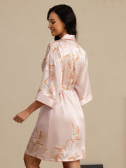 Women's pink 19Momme mulberry silk kimono robe with crane print and belt.