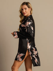 Women's black 19Momme mulberry silk nightshirt with crane print and high-low hem.