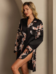 Women's black 19Momme mulberry silk crane print nightshirt with a high-low hem.