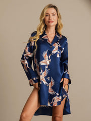 Women's navy mulberry silk nightshirt with crane print and high-low hem.