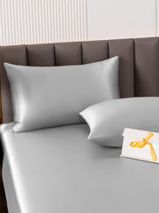 Silver 19 Momme mulberry silk pillowcase with hidden zipper and matching silk sheet.