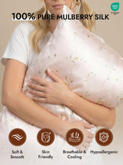 Snowbud Lily 19Momme 100% Mulberry Silk Pillowcase with delicate floral pattern, held by a woman.