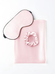Pink 19 Momme mulberry silk beauty sleep set: eye mask, scrunchie, and hidden zipper pillowcase.