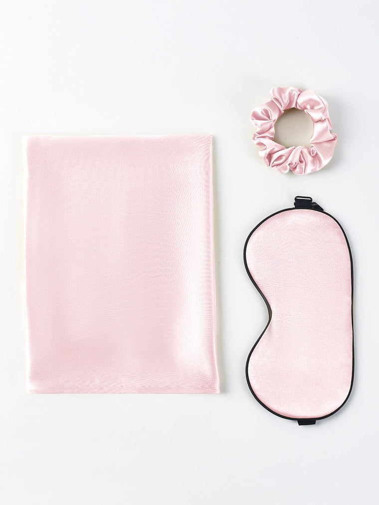 Pink 19 Momme mulberry silk 3-piece beauty sleep set with a hidden zipper pillowcase, eye mask, and scrunchie.