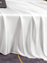 White 19 Momme mulberry silk flat sheet with elegant drape, perfect for luxurious bedding.