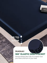 Navy blue mulberry silk fitted sheet with 360° elastic deep pocket, fits mattresses up to 30cm.