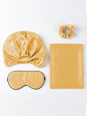 Golden mulberry silk beauty sleep set: bonnet, eye mask, scrunchie, and envelope pillowcase.