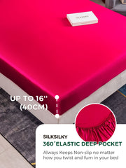 Vibrant pink 19 Momme mulberry silk fitted sheet with 360° elastic deep pocket, fitting mattresses up to 16".
