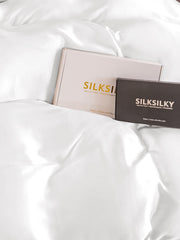 White 19 Momme Mulberry Silk seamless duvet cover with two product boxes.