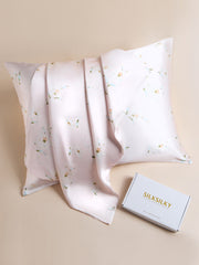 Pink 19 Momme mulberry silk pillowcase with delicate white floral print and matching silk scarf.
