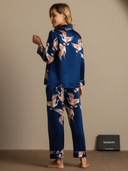 Women's mulberry silk pajamas: navy blue, long-sleeve, notch collar, crane print.