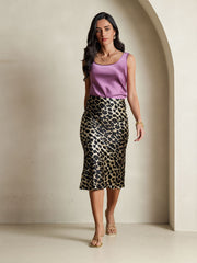 Women's 19Momme pure mulberry silk leopard print stretch straight long skirt with a purple silk top.
