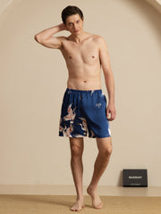 Men's navy blue mulberry silk sleep shorts with crane print and elastic waist.