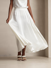 White 19Momme mulberry silk A-line maxi skirt with lining, shown flowing on a model.