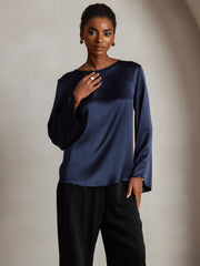 Women's navy mulberry silk bell sleeve boat neck top.