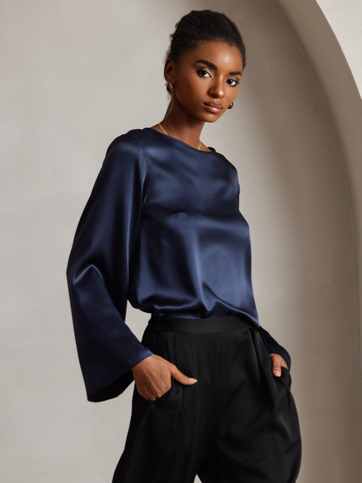 Dark blue 19Momme mulberry silk bell sleeve boat neck women's top.