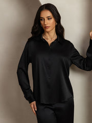Women's black 19Momme mulberry silk button-up shirt and wide-leg pants set.