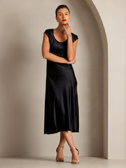 Black 19Momme mulberry silk cap sleeve round neck midi dress on a woman.