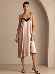 Women's 19Momme mulberry silk contrast V-neck midi dress in blush pink with black spaghetti straps.