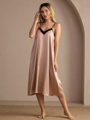 Women's 19Momme mulberry silk contrast V-neck spaghetti strap midi nightgown in blush pink with black trim.