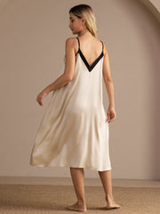 Women's 19 Momme mulberry silk midi nightgown in ivory with black V-neck and spaghetti straps.