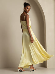 Women's yellow 19 Momme mulberry silk cowl neck camisole top and A-line maxi skirt set.