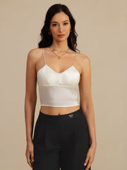 White 19Momme mulberry silk crop top with spaghetti straps, V-neck, and built-in bra.
