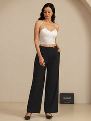 White 19 Momme mulberry silk crop top camisole with spaghetti straps and built-in bra, paired with black wide-leg pants.