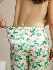 Women's 19 Momme mulberry silk green floral print wide-leg pants with side pockets and elastic waist.