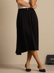 Black 19Momme mulberry silk high-waist A-line pleated midi skirt with pockets, worn by a woman.