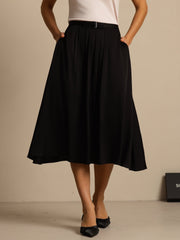 Black 19Momme mulberry silk high-waist A-line pleated midi skirt with pockets.
