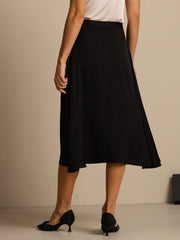 Black 19Momme mulberry silk high-waist A-line midi skirt with subtle pleats and pockets.