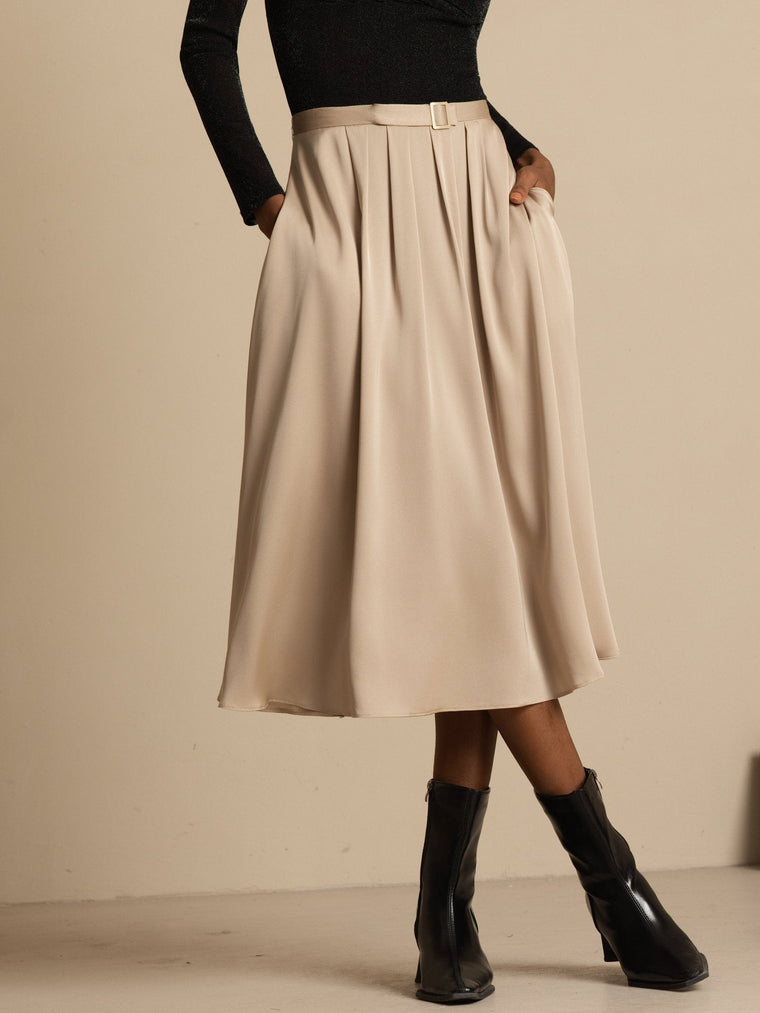 Tan 19Momme mulberry silk high-waist A-line pleated midi skirt with pockets.