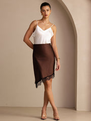 Brown mulberry silk high-waist asymmetrical lace hem skirt with white silk camisole.