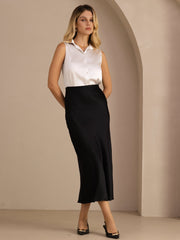 Elegant black 19Momme mulberry silk high waist maxi skirt with a white sleeveless top.