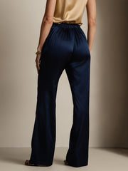 Women's 19 Momme mulberry silk high waist straight fit pants in navy with elastic back.