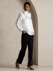 Women's black 19 Momme silk high waist straight fit pants with zipper side pockets.
