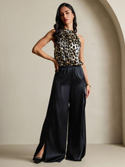 Women's 19Momme mulberry silk leopard print sleeveless halter neck top with black satin wide-leg pants.