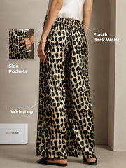 Women's 19Momme silk leopard print wide-leg pants with elastic back waist and side pockets.