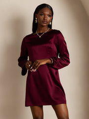 Maroon 19 Momme mulberry silk boat neck long sleeve short dress on a model.