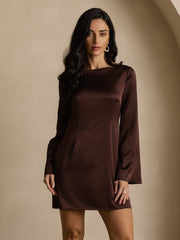 Woman in a brown 19 Momme mulberry silk long sleeve boat neck short dress.