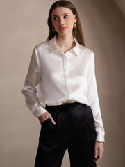 White 19Momme mulberry silk long sleeve lapel collar women's shirt with black pants.