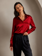 Women's mulberry silk long sleeve lapel collar shirt in rich red, paired with black silk pants.