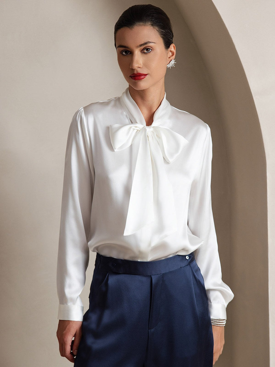 White 19Momme mulberry silk long sleeve tie neck blouse, size S(6), paired with navy trousers.