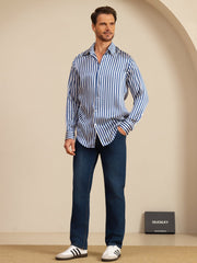 Men's long sleeve mulberry silk shirt with blue and white stripes, lapel collar, worn with dark jeans.