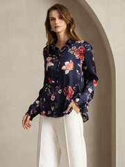 Women's navy mulberry silk long-sleeve shirt with red floral print and lapel collar.